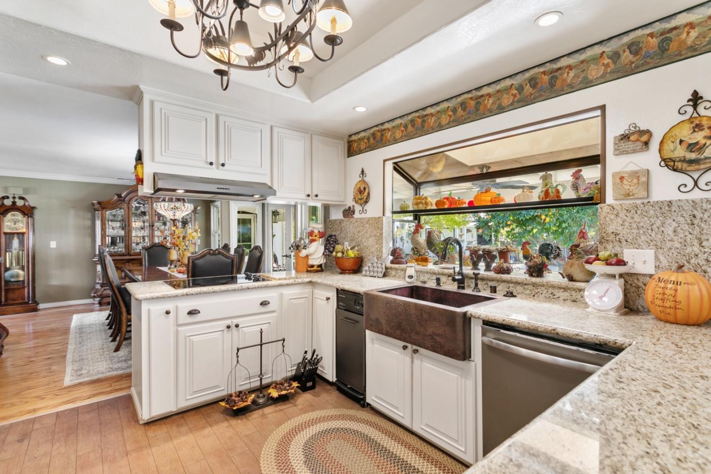 1990 Day Road Gilroy, CA 95020 - Photo 24 of 42 a kitchen that has a lot of cabinets in it