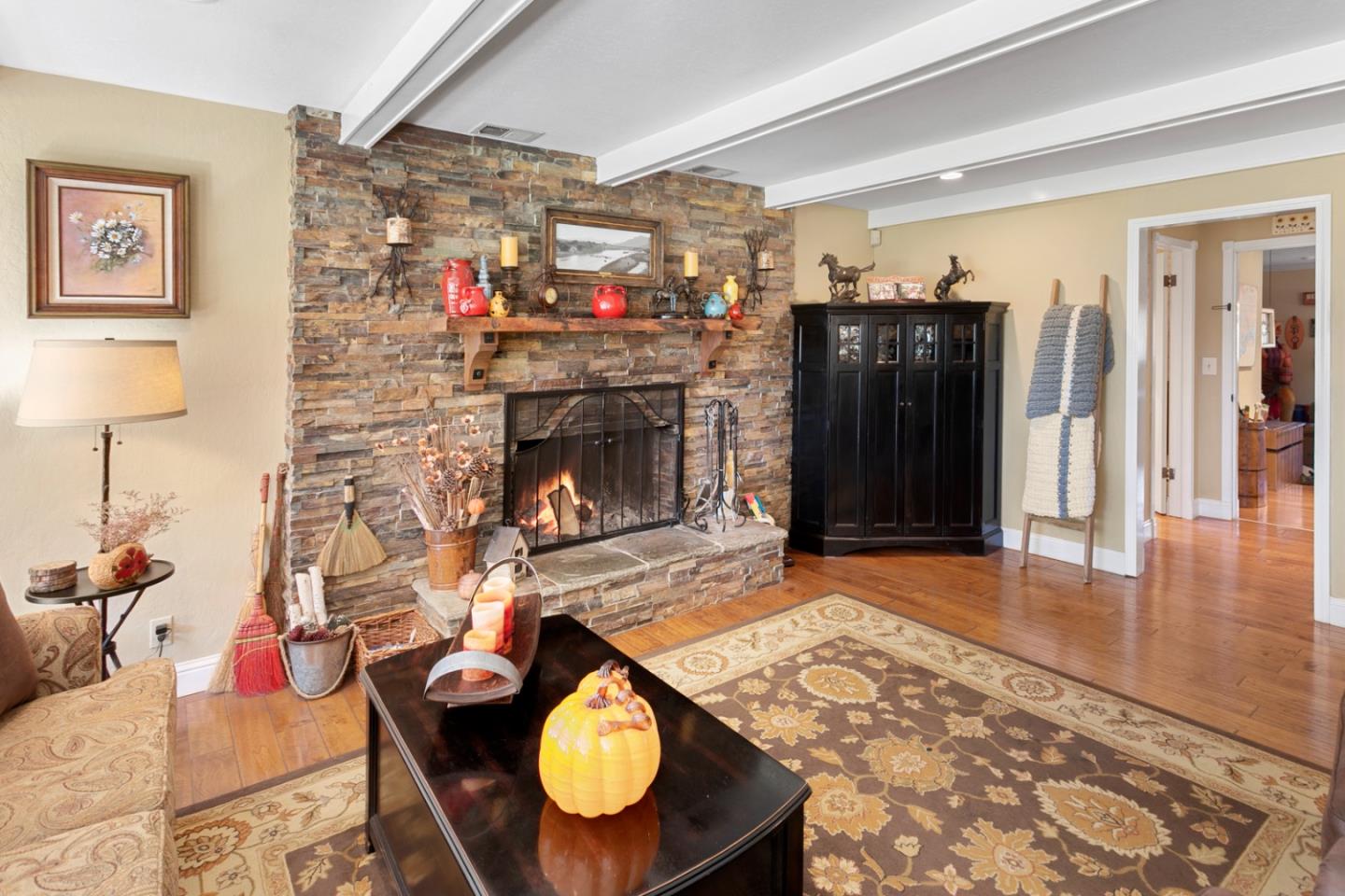 1990 Day Road Gilroy, CA 95020 - Photo 25 of 42 a living room with furniture and a fireplace