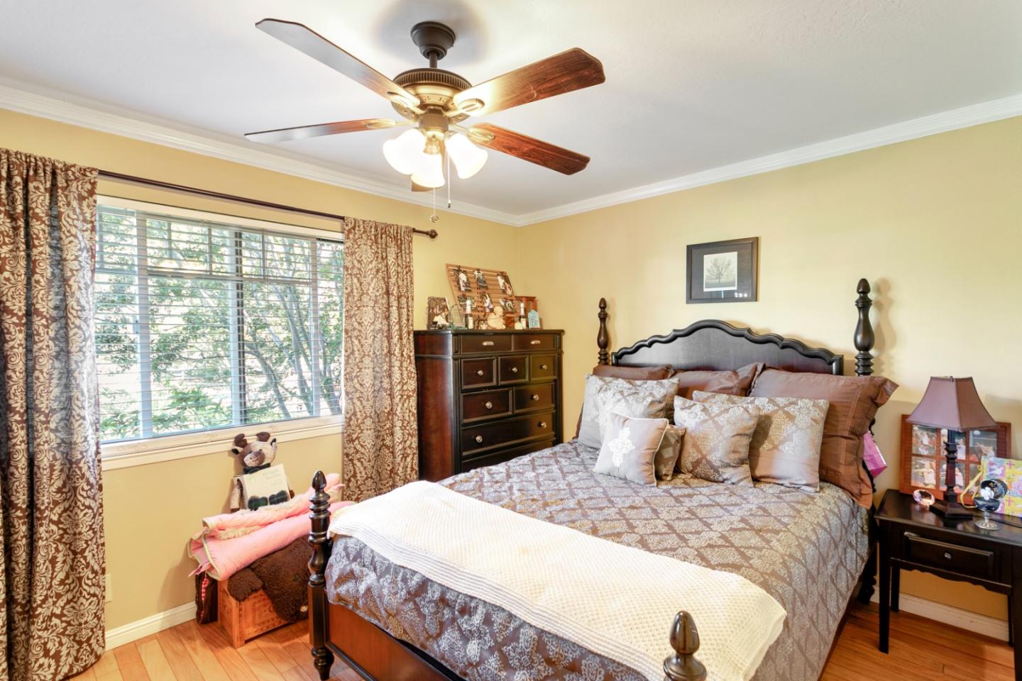 1990 Day Road Gilroy, CA 95020 - Photo 28 of 42 a bedroom with a bed and wooden floor