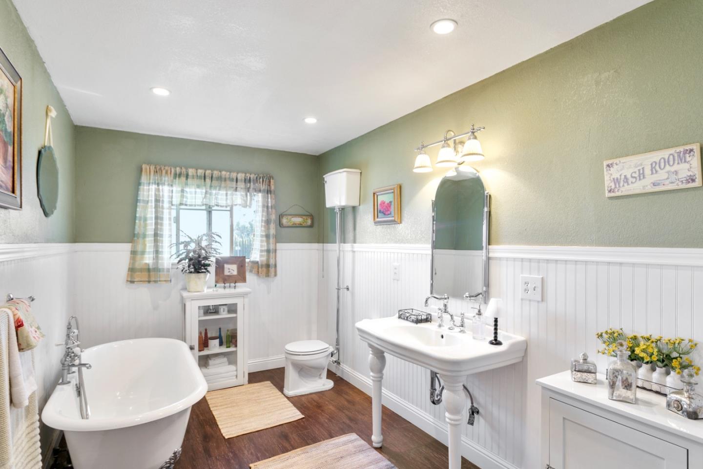 1990 Day Road Gilroy, CA 95020 - Photo 29 of 42 a bathroom with a sink toilet and a mirror