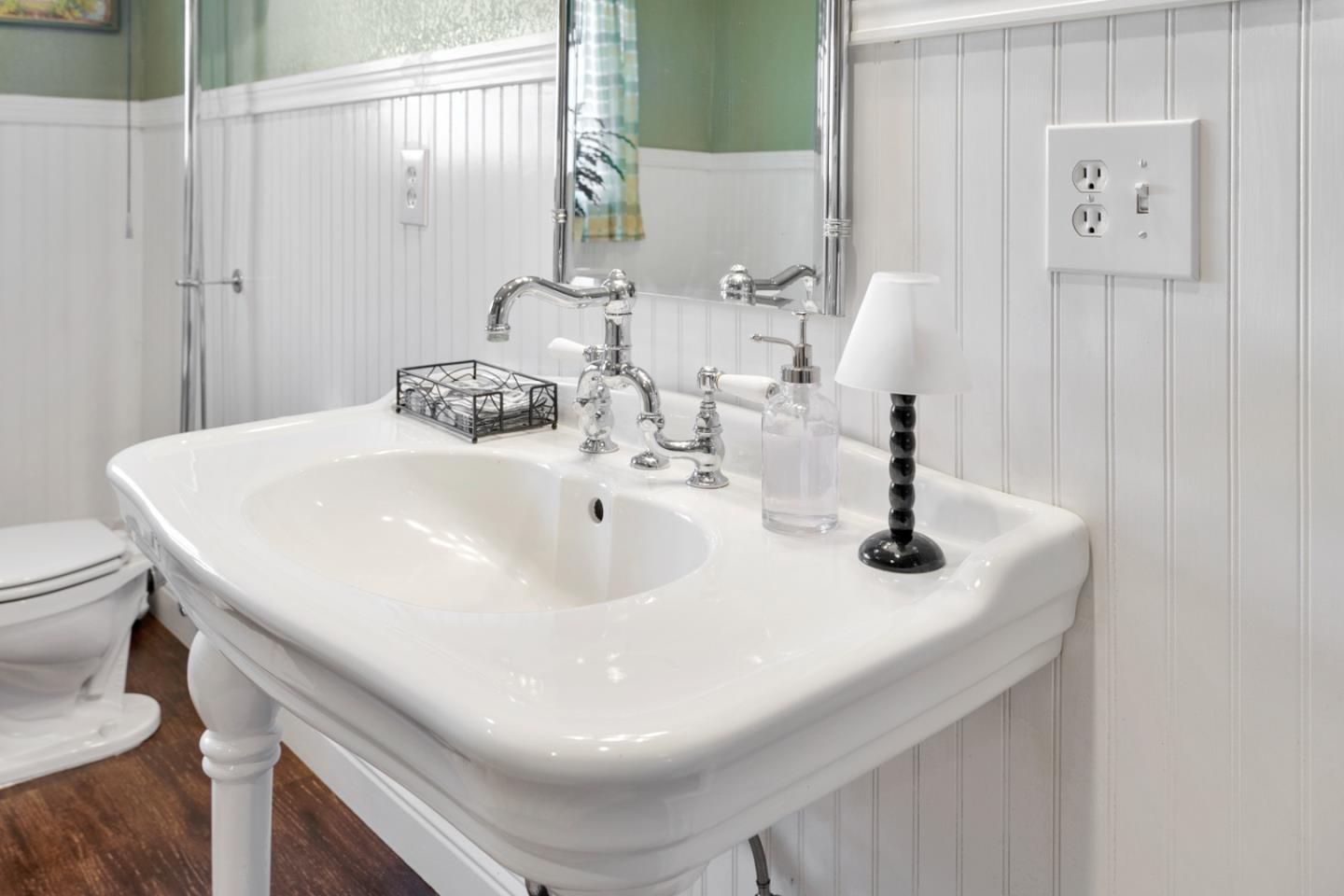 1990 Day Road Gilroy, CA 95020 - Photo 30 of 42 a bathroom with a sink and a mirror