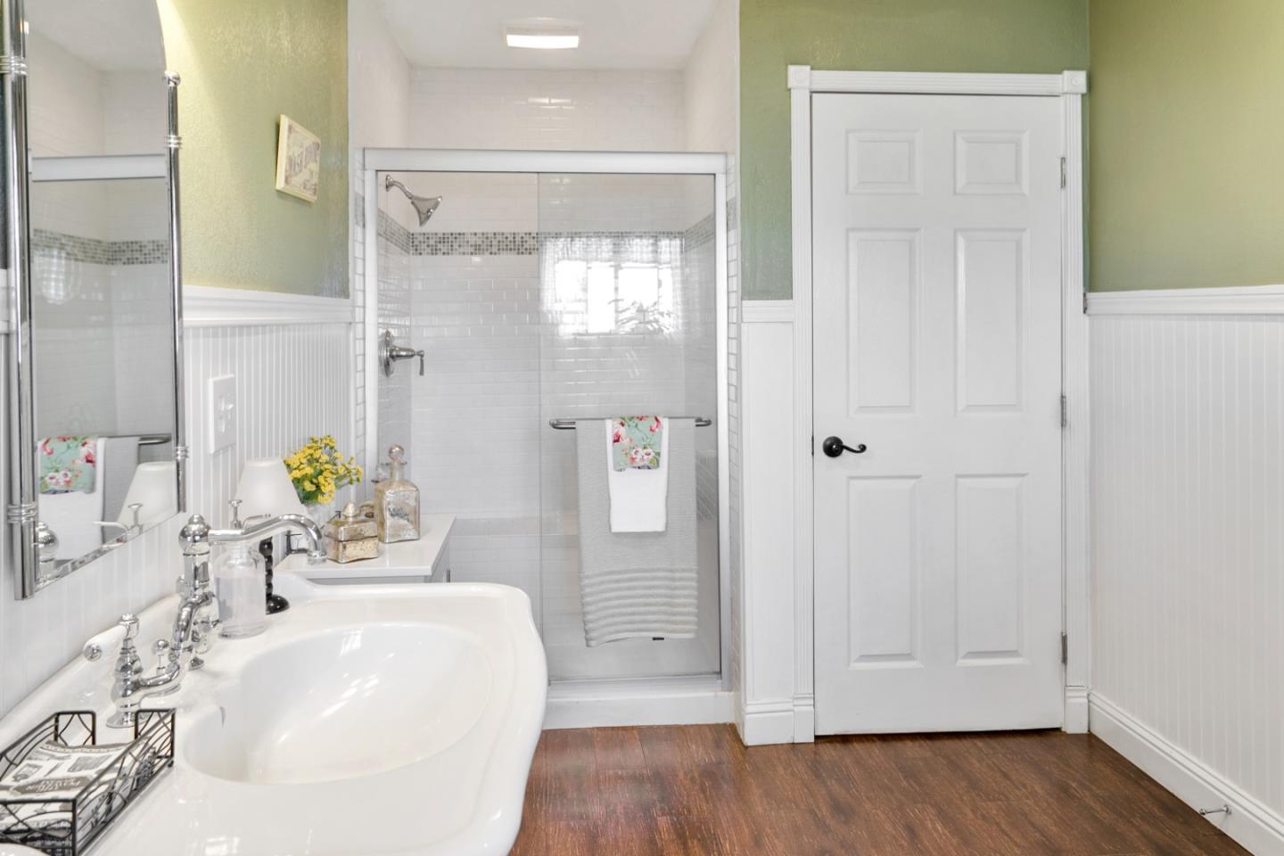 1990 Day Road Gilroy, CA 95020 - Photo 31 of 42 a bathroom with a tub shower vanity and a sink