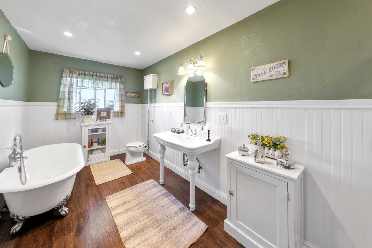 1990 Day Road Gilroy, CA 95020 - Photo 33 of 42 a bathroom with a sink mirror and a bathtub
