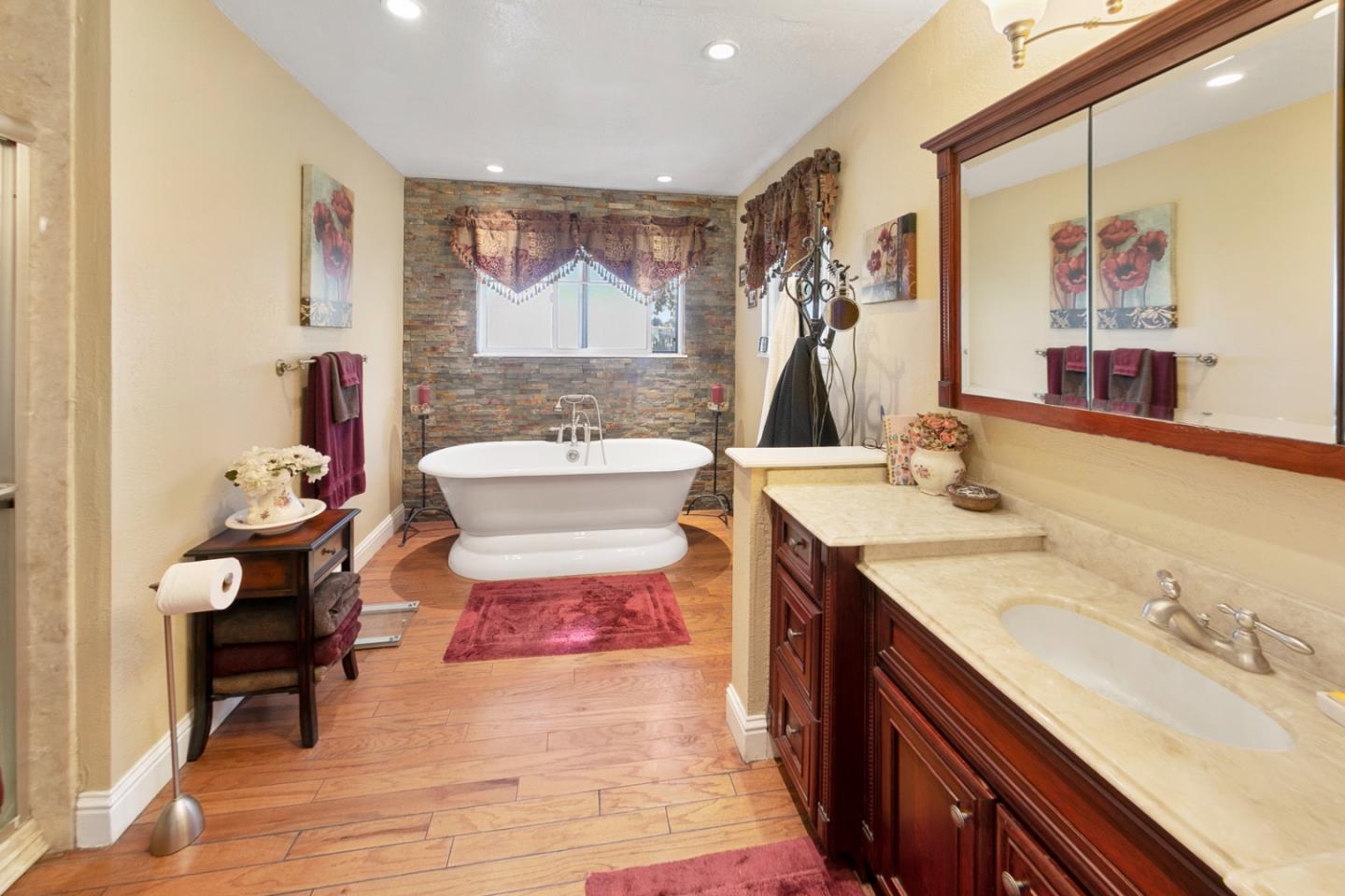 1990 Day Road Gilroy, CA 95020 - Photo 34 of 42 a bathroom with a double vanity sink mirror and toilet