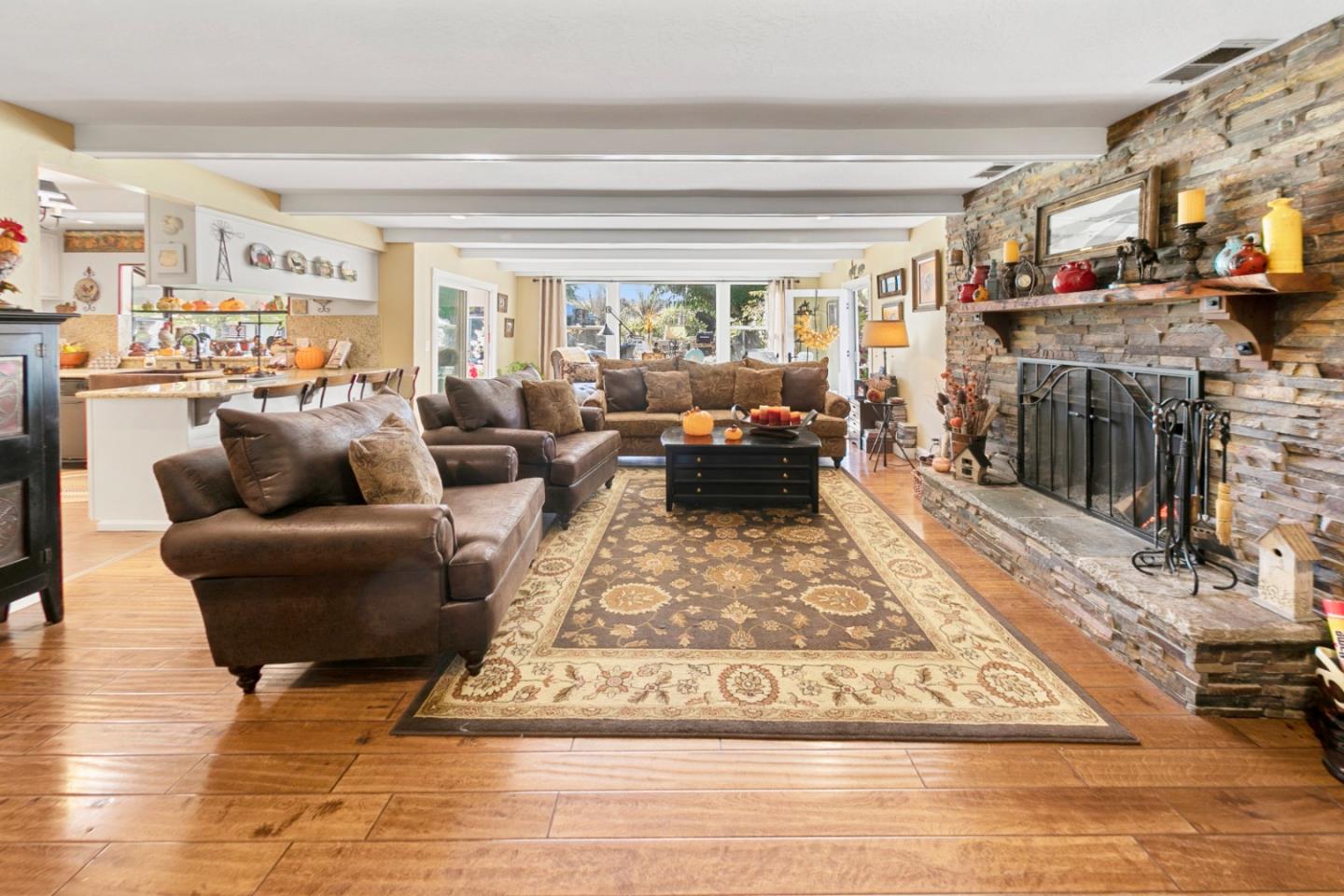 1990 Day Road Gilroy, CA 95020 - Photo 35 of 42 a living room with furniture and a fireplace
