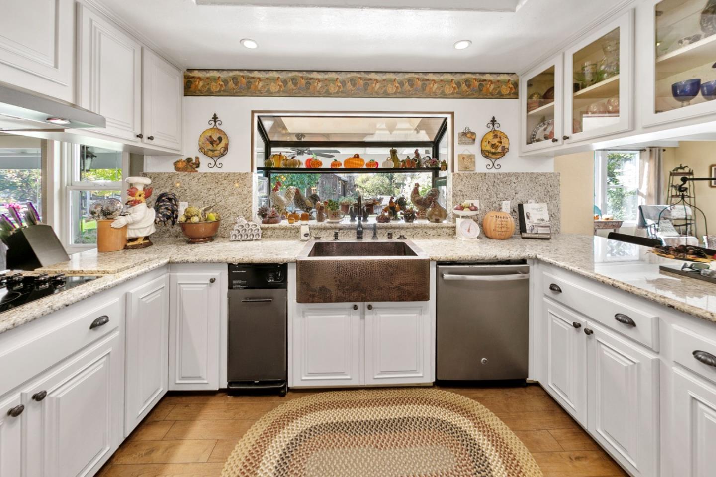 1990 Day Road Gilroy, CA 95020 - Photo 39 of 42 a kitchen with a sink stove and cabinets