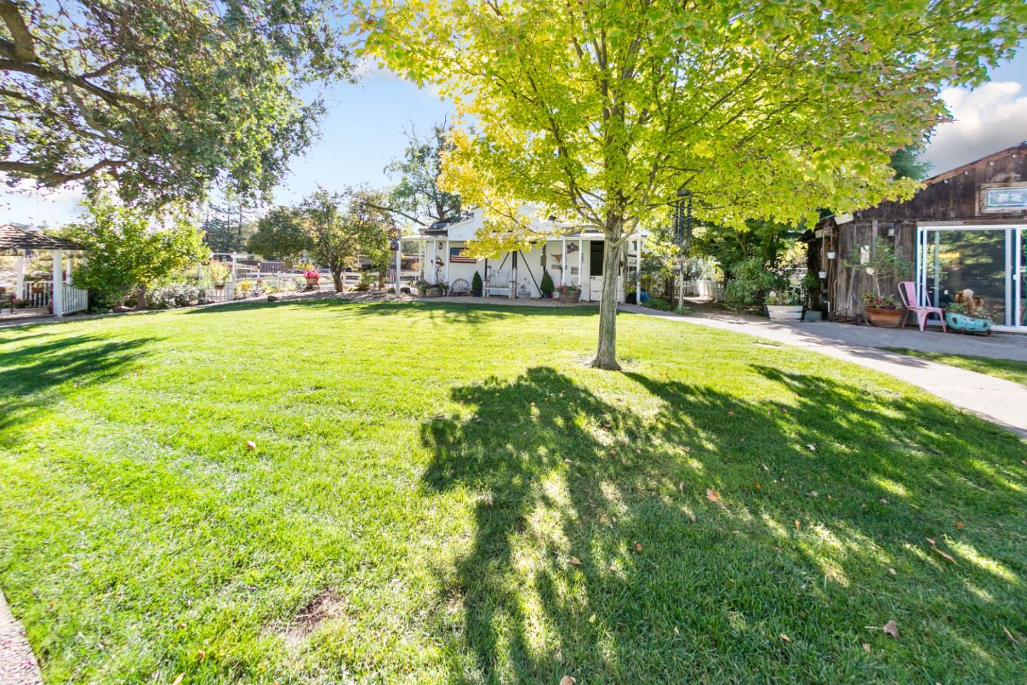 1990 Day Road Gilroy, CA 95020 - Photo 42 of 42 a view of swimming pool with lawn chairs and large trees