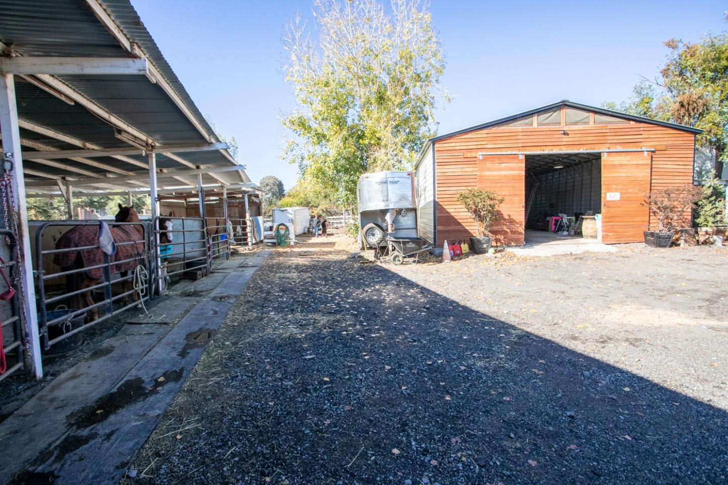 1990 Day Road Gilroy, CA 95020 - Photo 9 of 42 a view of a car park in front of a house