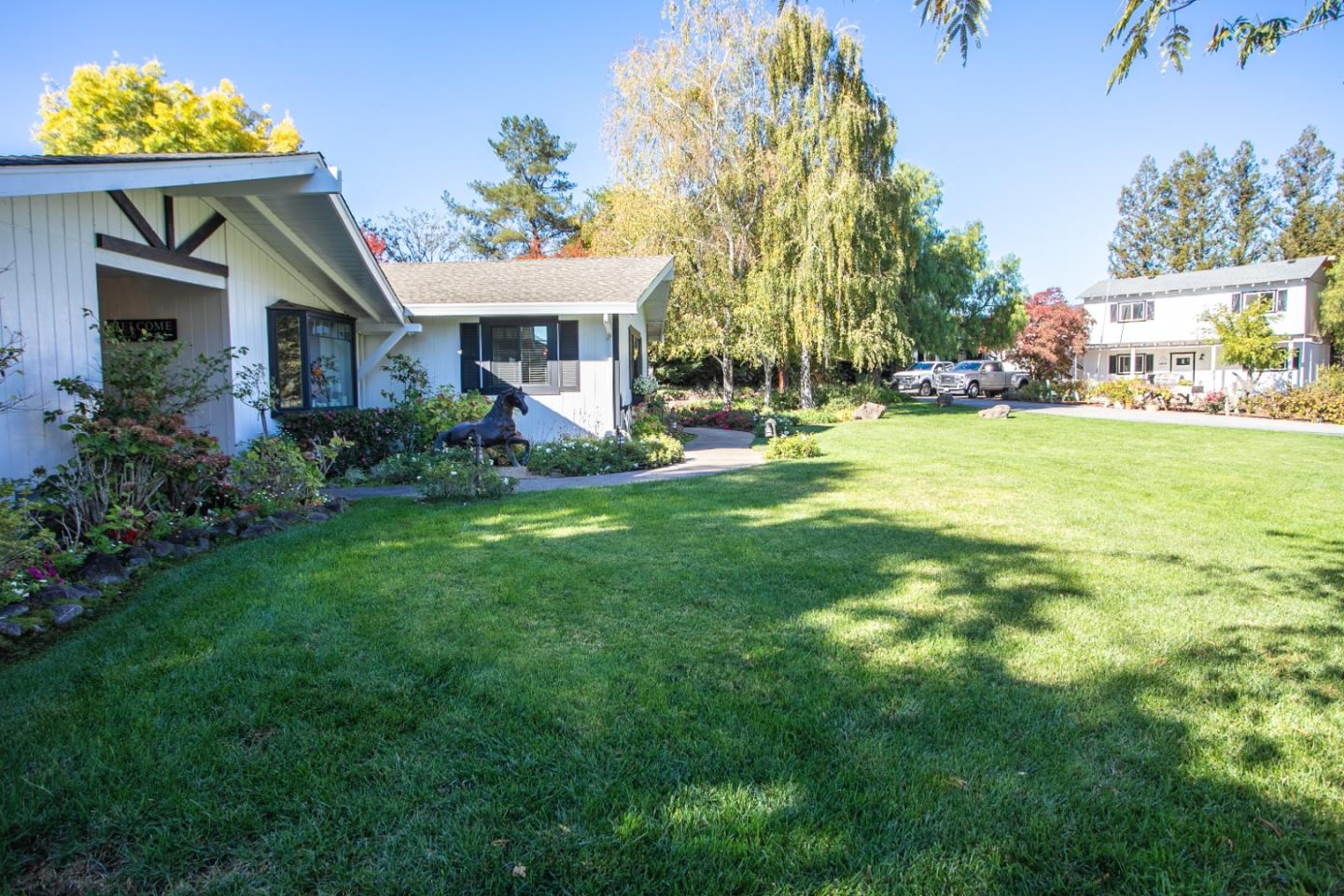 1990 Day Road Gilroy, CA 95020 - Photo 10 of 42 a view of a house with a garden