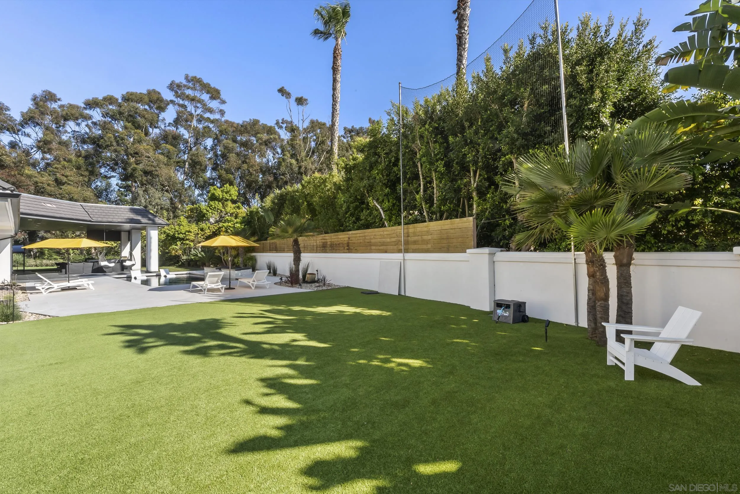 6850 Avenida De La Ronda Rancho Santa Fe, CA 92067 - Photo 32 of 40 a view of a backyard with swimming pool
