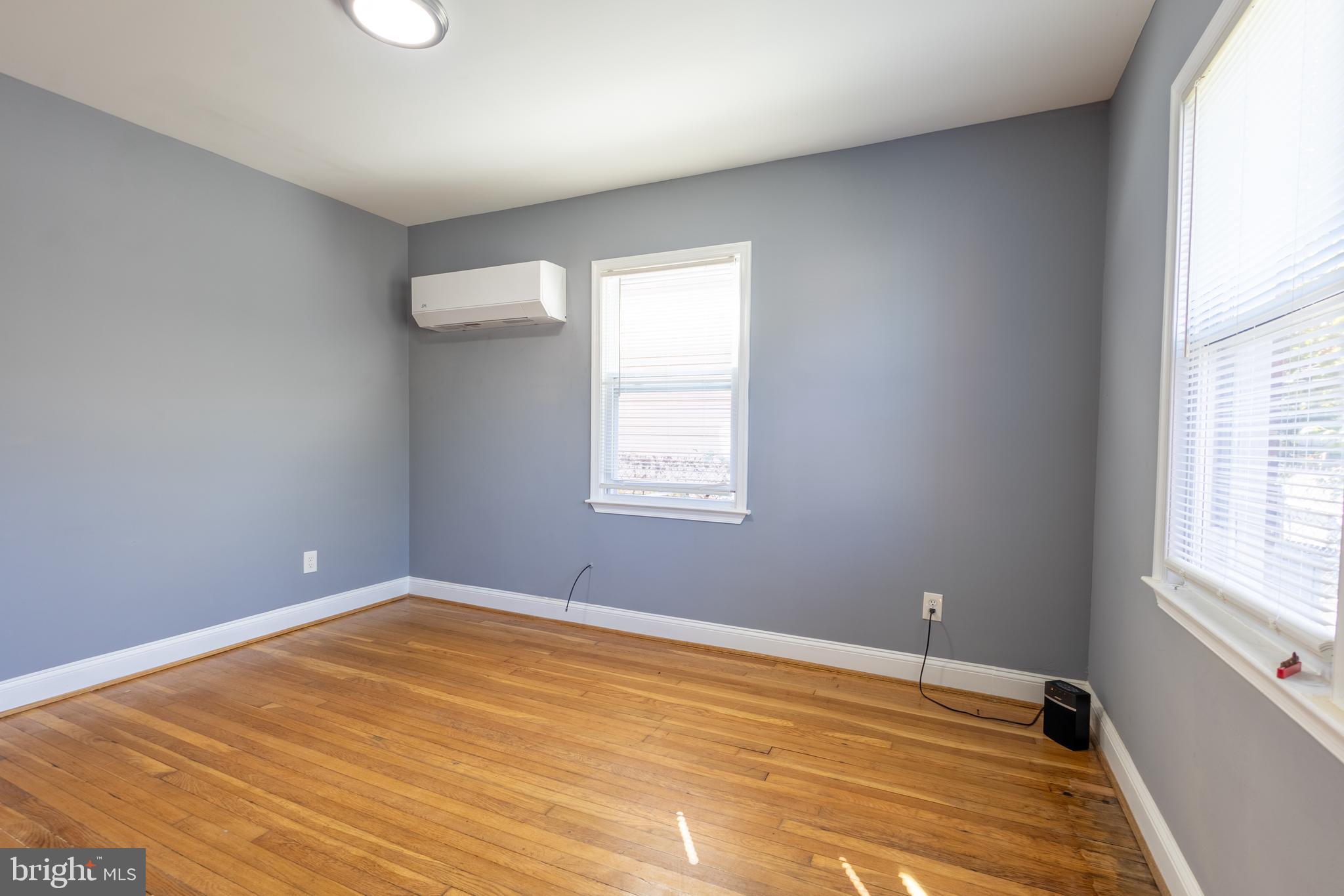 2204 16th Street Southeast, Unit 2 Washington, DC 20020 - Photo 5 of 11 a view of an empty room with a window