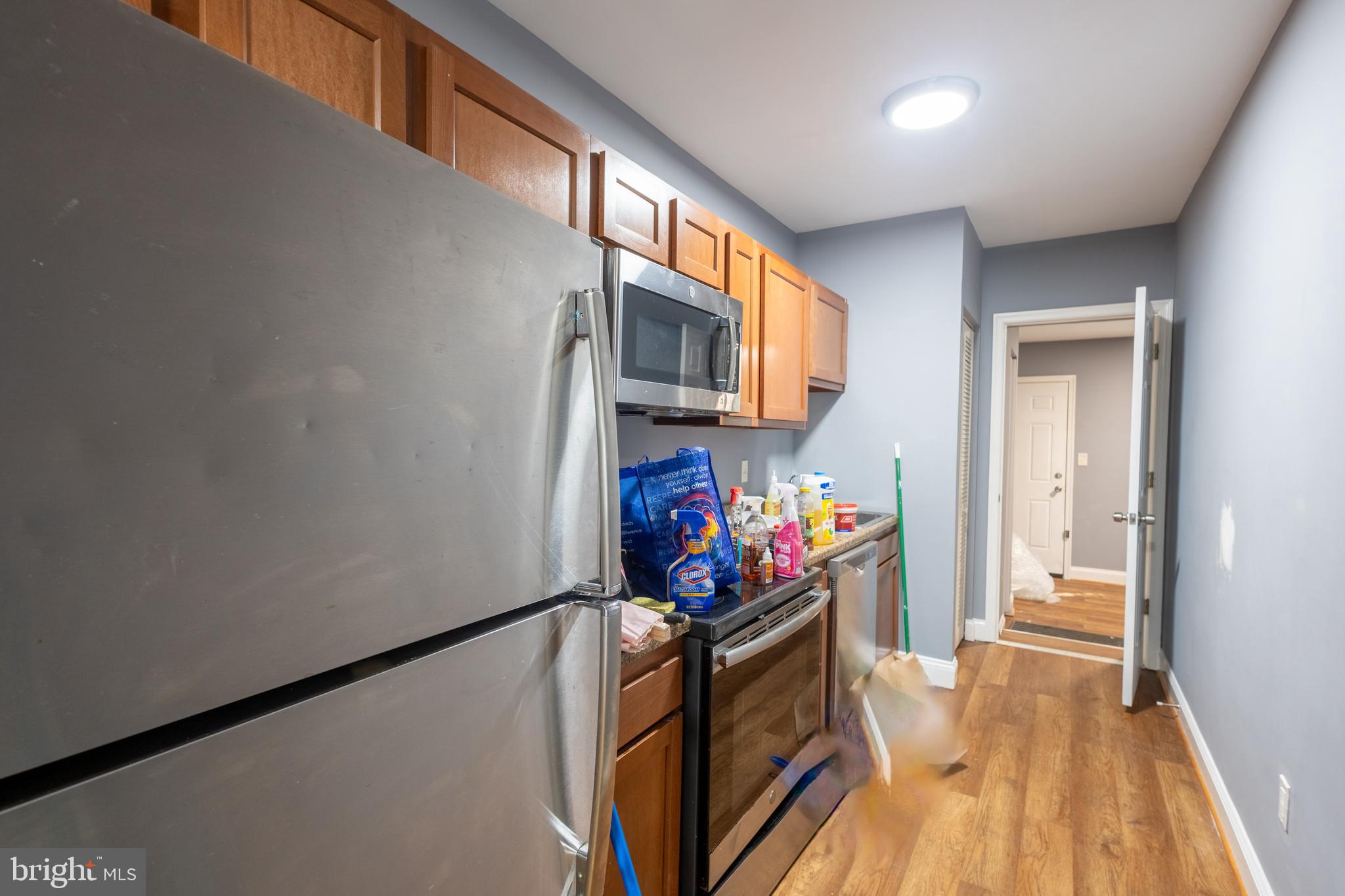 2204 16th Street Southeast, Unit 2 Washington, DC 20020 - Photo 9 of 11 a view of living room kitchen and microwave