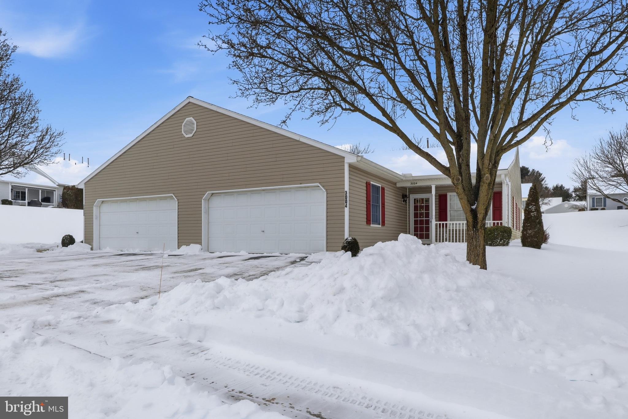3004 Lakefield Road, Unit 3004 York, PA 17402 - Photo 2 of 33 a view of a house with a yard covered in snow