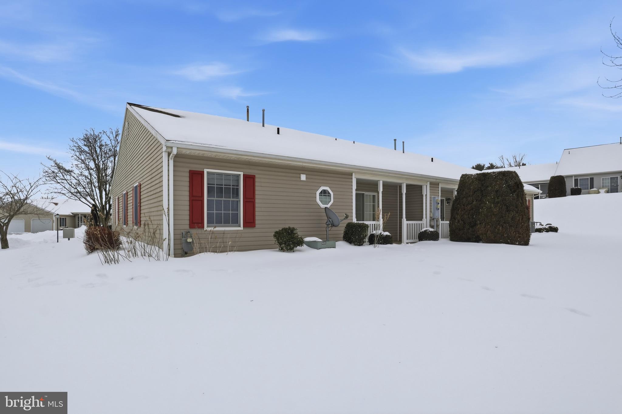 3004 Lakefield Road, Unit 3004 York, PA 17402 - Photo 32 of 33 a view of a house with backyard and sitting area