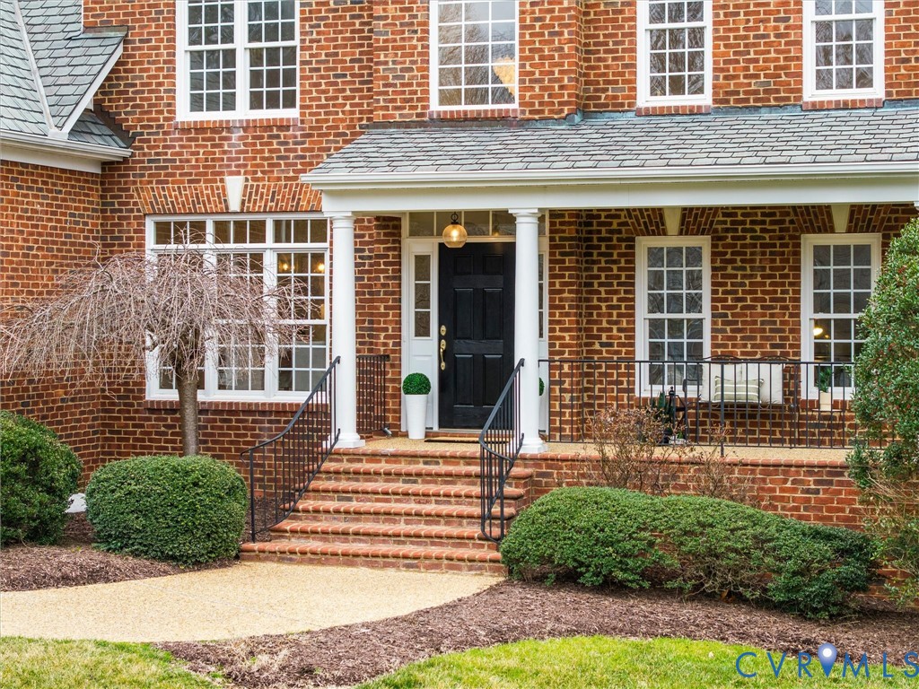 14335 Lander Road Midlothian, VA 23113 - Photo 6 of 70 a front view of a house with a yard
