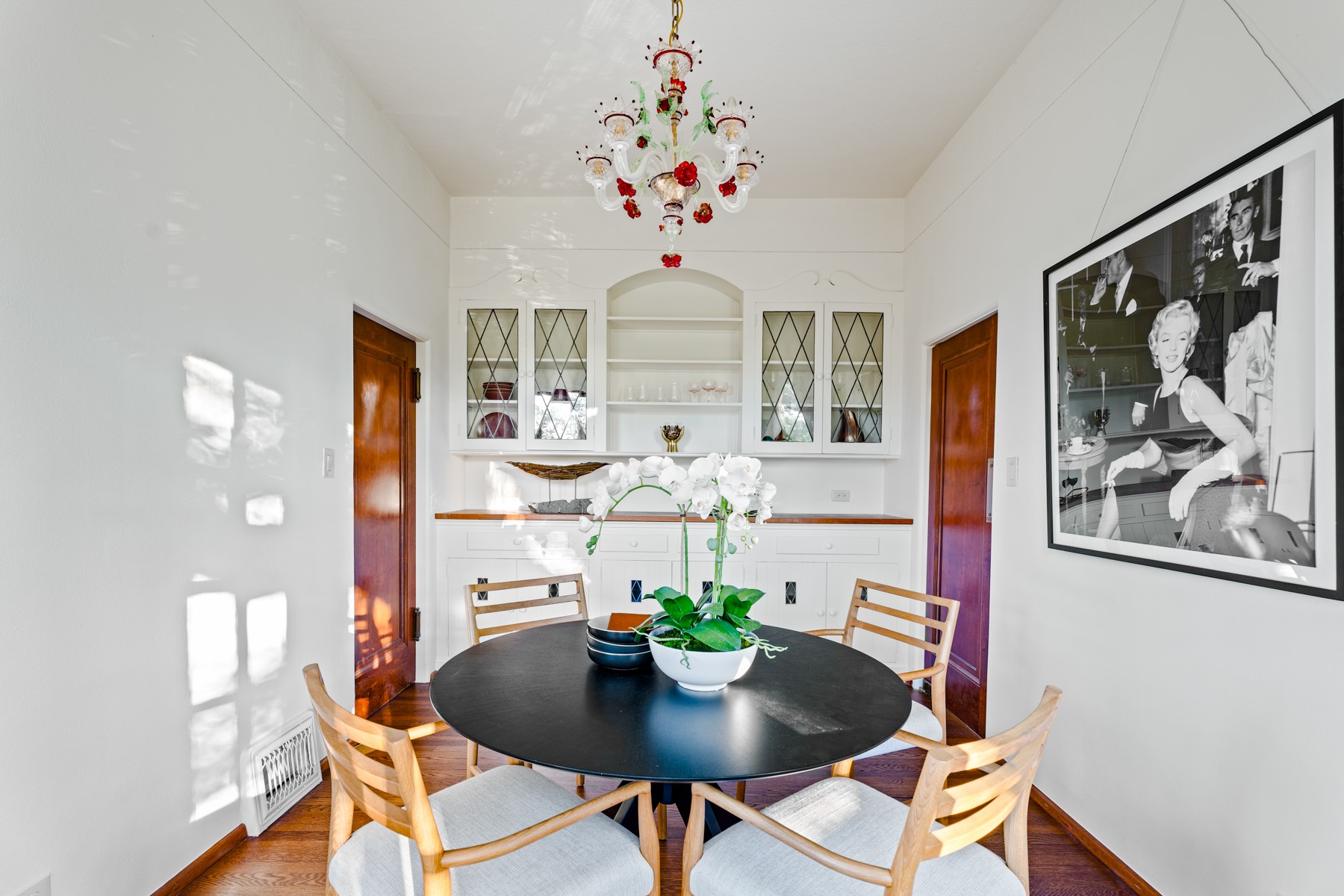 806 Rosedale Terrace Austin, TX 78704 - Photo 12 of 40 a view of a dining room with furniture wooden floor and chandelier