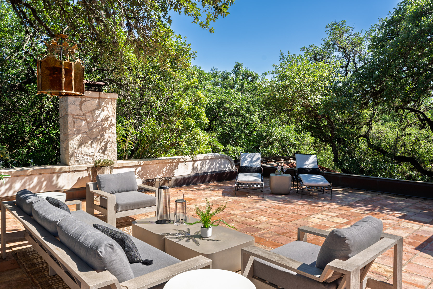 806 Rosedale Terrace Austin, TX 78704 - Photo 28 of 40 a view of a patio with couches and a table and chairs with wooden fence