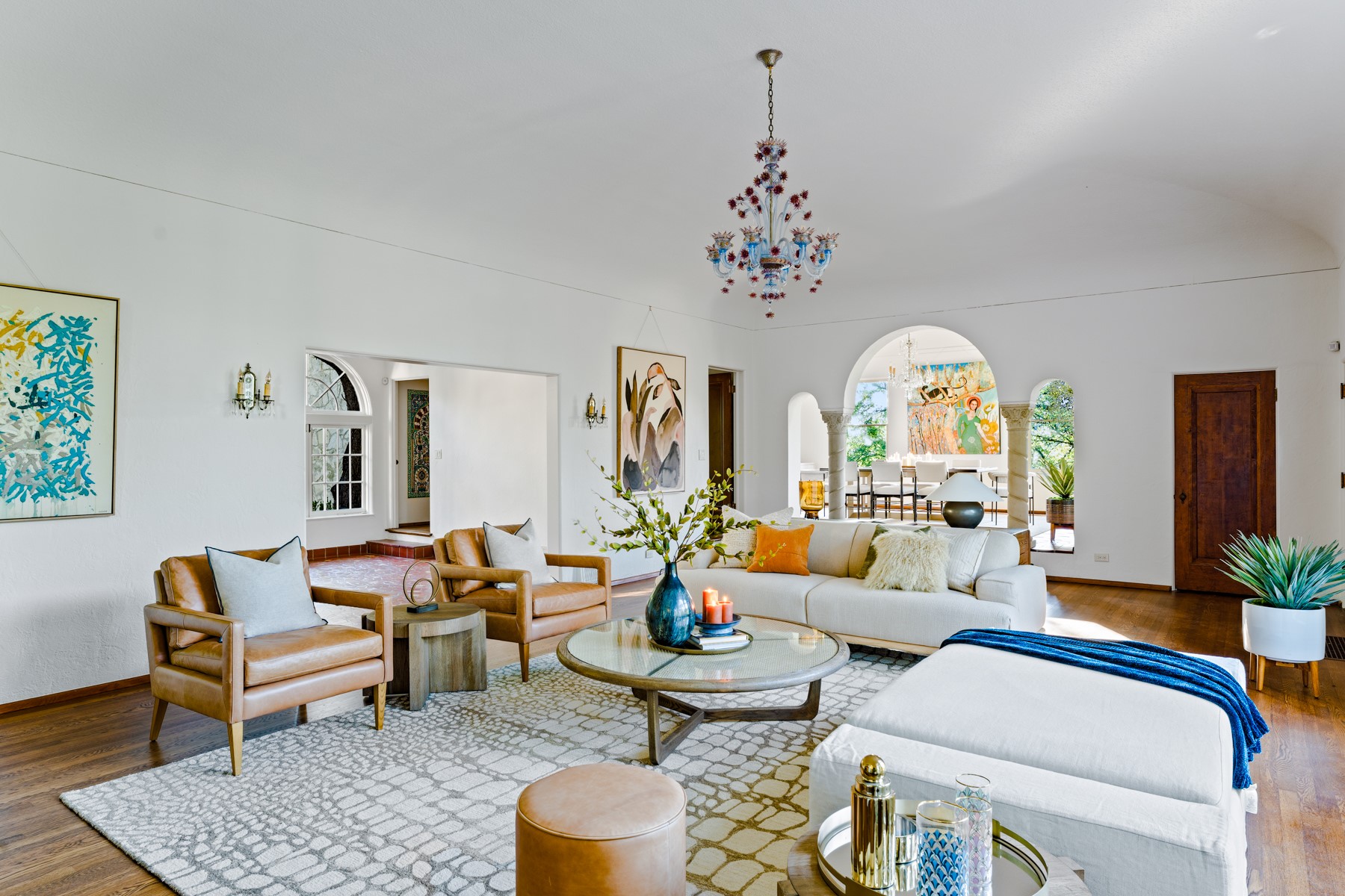 806 Rosedale Terrace Austin, TX 78704 - Photo 6 of 40 a living room with furniture a chandelier and a rug