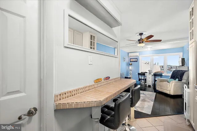 a view of a livingroom with furniture and toys