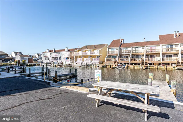 a view of a lake with building in front of it