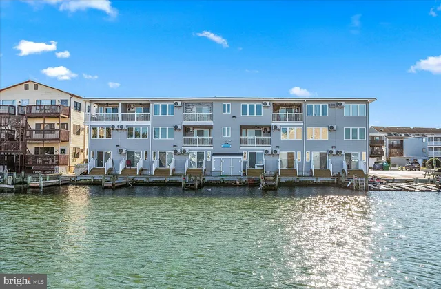 a view of building with lake view and boat