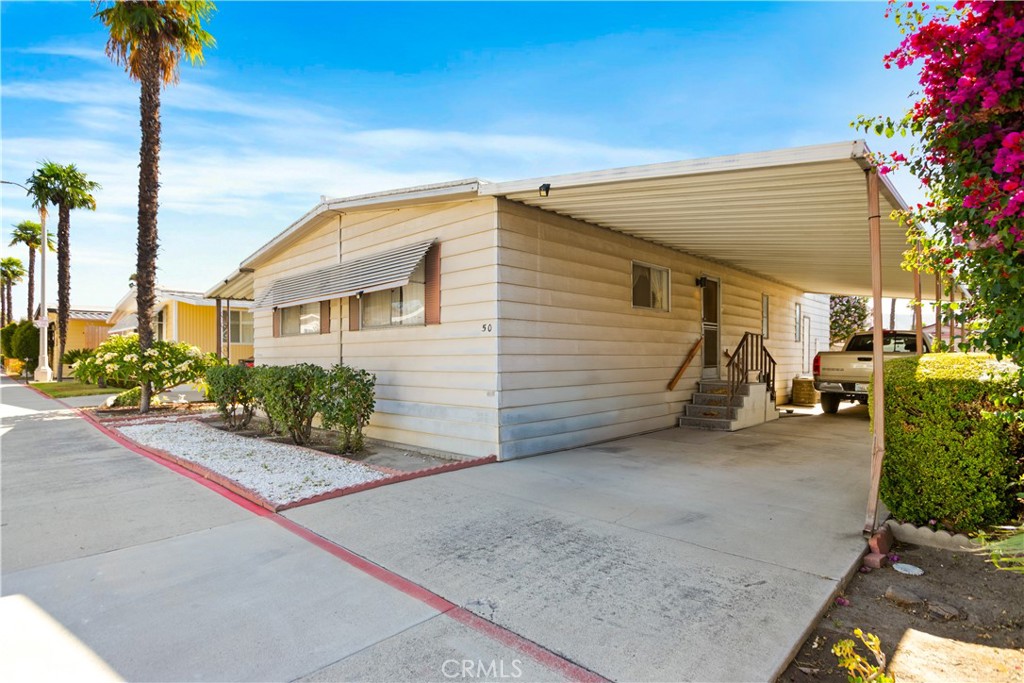 3745 Valley Boulevard, Unit 50 Walnut, CA 91789 - Photo 2 of 32 a view of a house with a patio