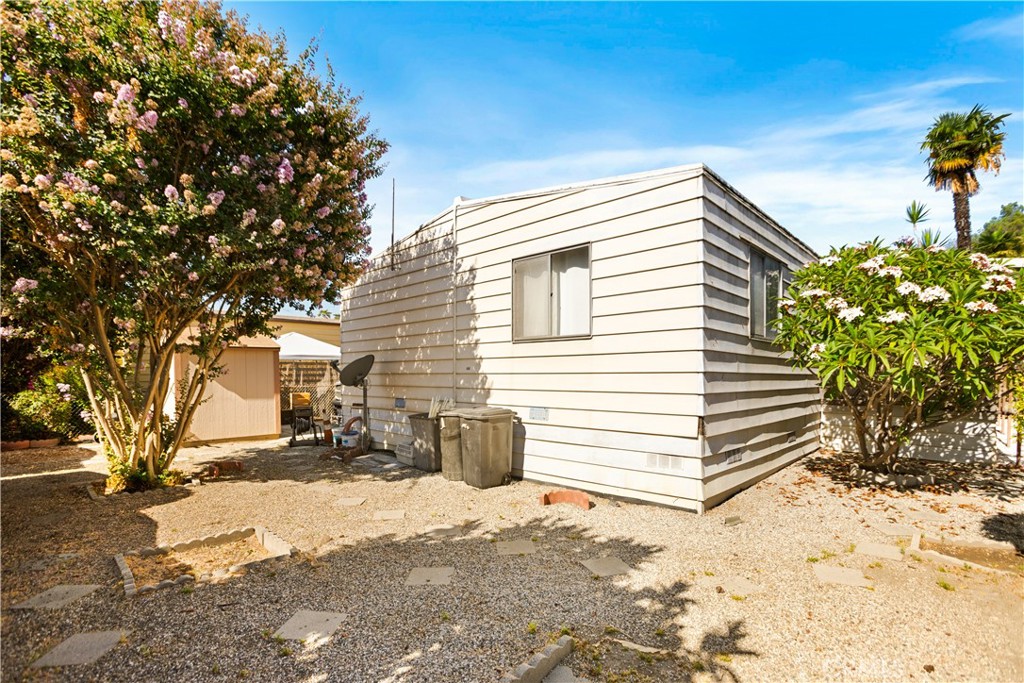 3745 Valley Boulevard, Unit 50 Walnut, CA 91789 - Photo 21 of 32 a view of a house with a yard