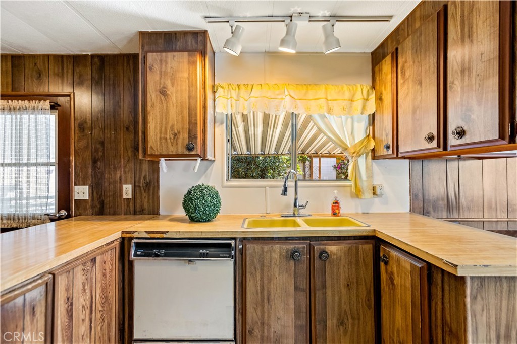 3745 Valley Boulevard, Unit 50 Walnut, CA 91789 - Photo 4 of 32 a kitchen with a sink and a window