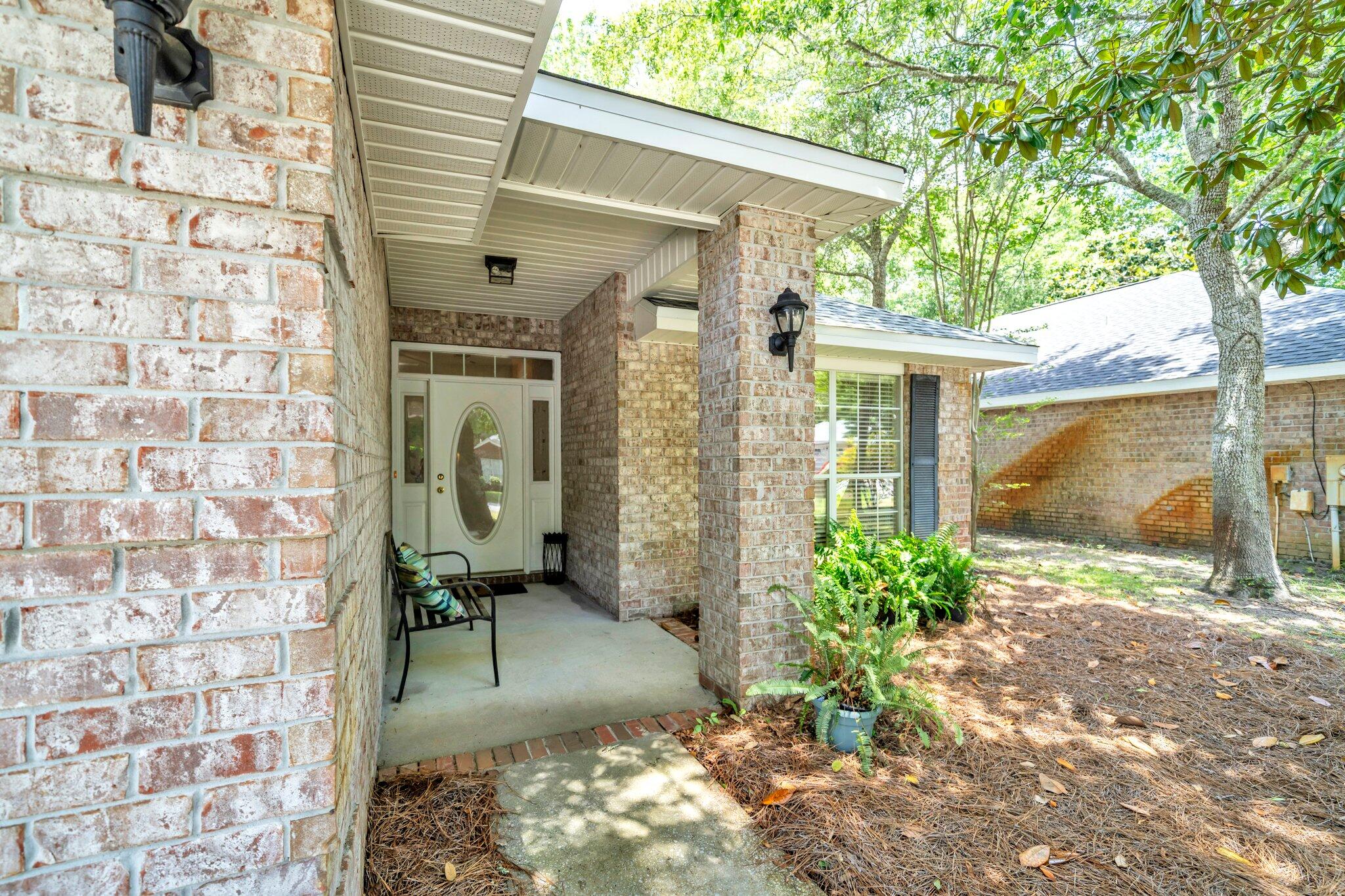 174 Bayou Landing Road Miramar Beach, FL 32550 - Photo 2 of 42 a front view of a house with a yard