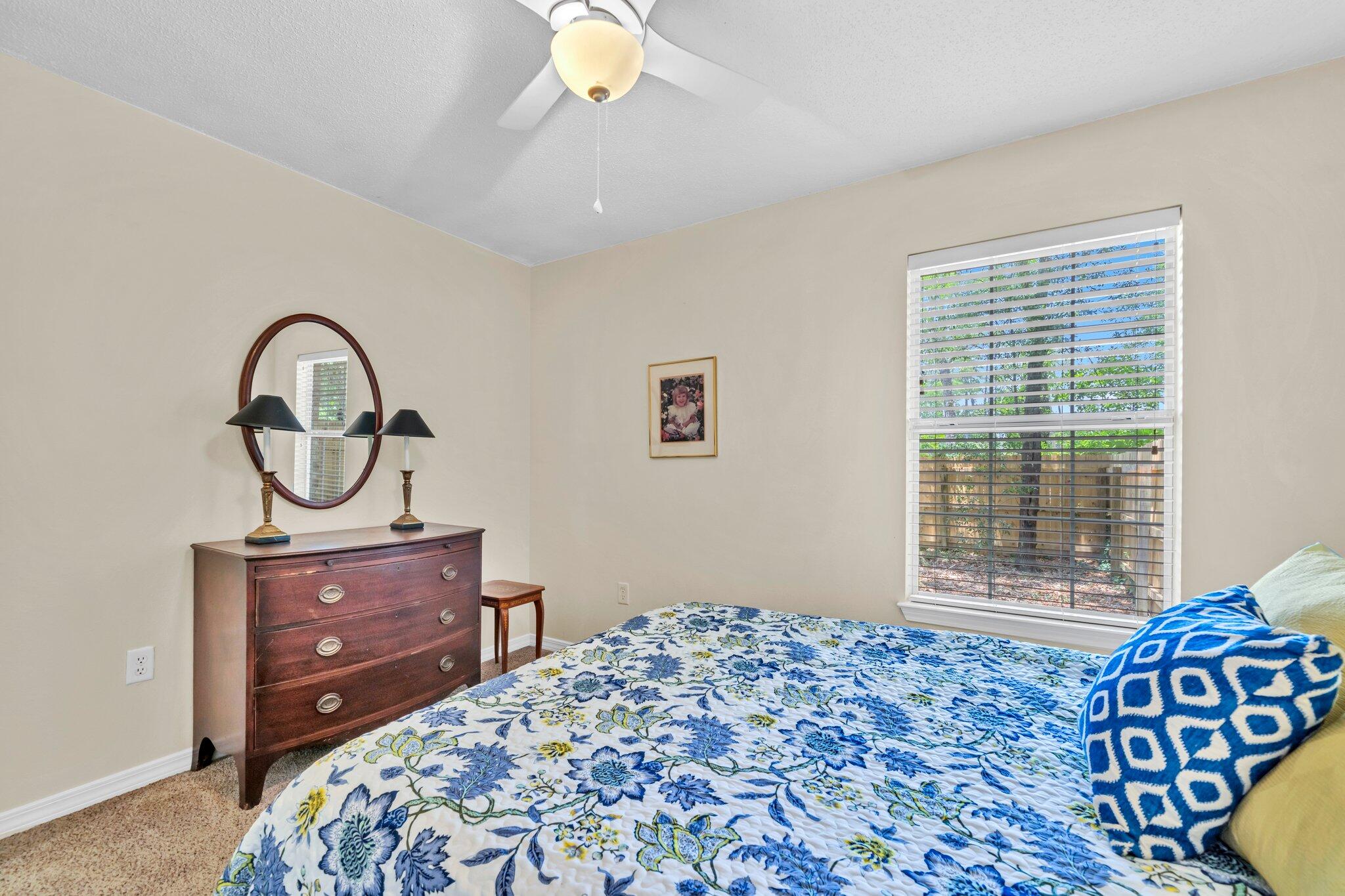 174 Bayou Landing Road Miramar Beach, FL 32550 - Photo 23 of 42 a bedroom with a bed and a window