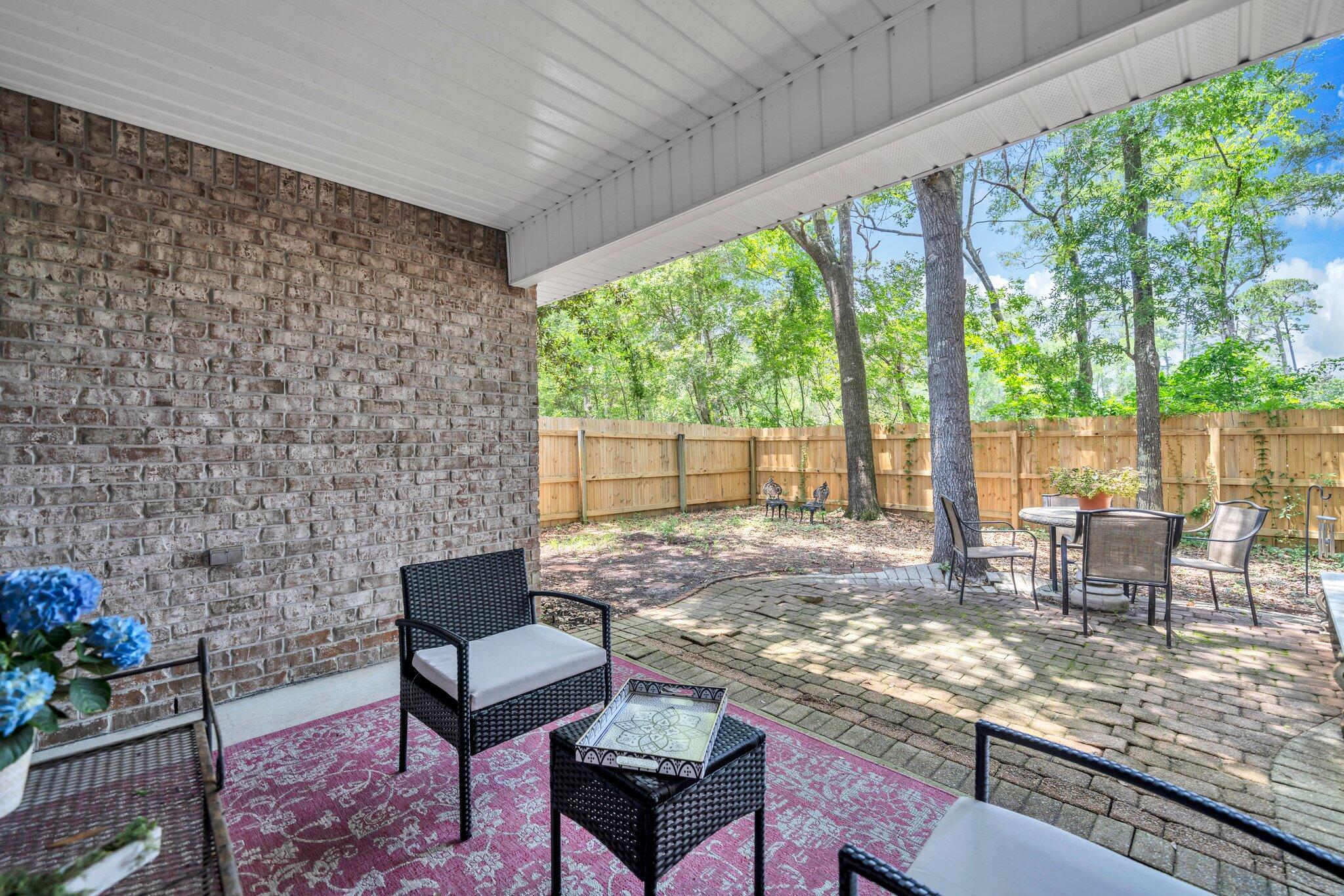 174 Bayou Landing Road Miramar Beach, FL 32550 - Photo 34 of 42 a outdoor living space with furniture and a garden