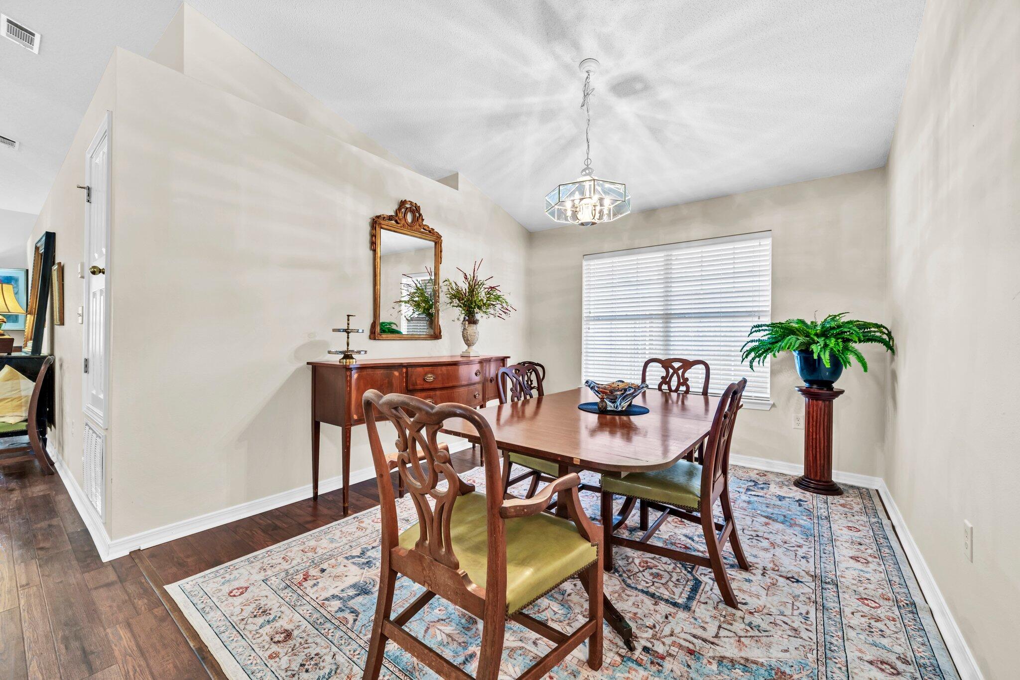 174 Bayou Landing Road Miramar Beach, FL 32550 - Photo 5 of 42 a view of a dining room with furniture and window