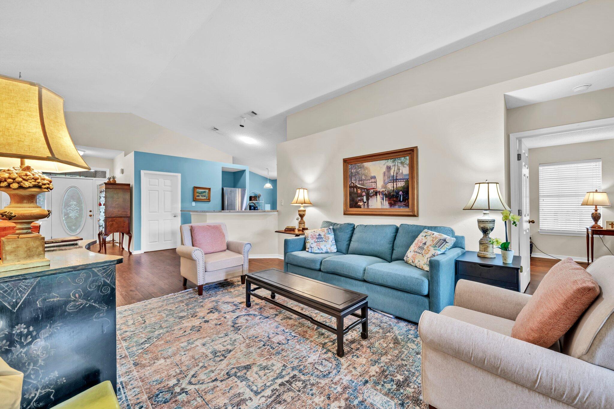 174 Bayou Landing Road Miramar Beach, FL 32550 - Photo 8 of 42 a living room with furniture a rug and a flat screen tv