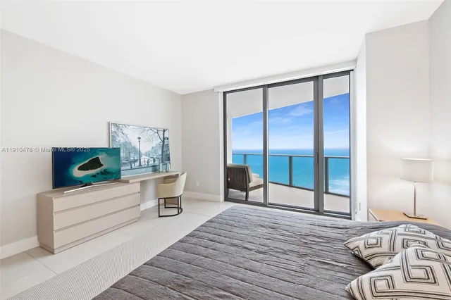 a view of spacious bathroom with dual sinks
