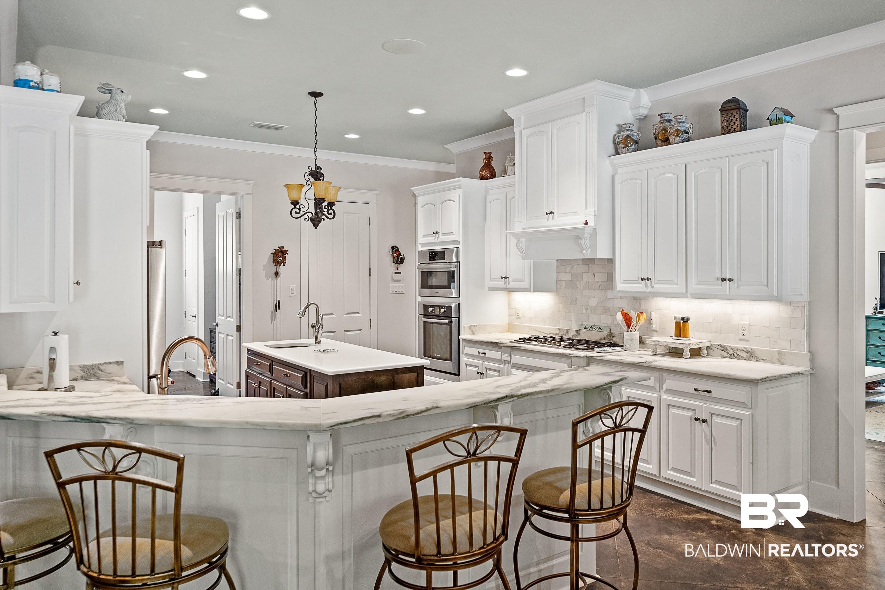 585 Falling Water Boulevard Fairhope, AL 36532 - Photo 13 of 67 Gourmet Kitchen with Breakfast Bar