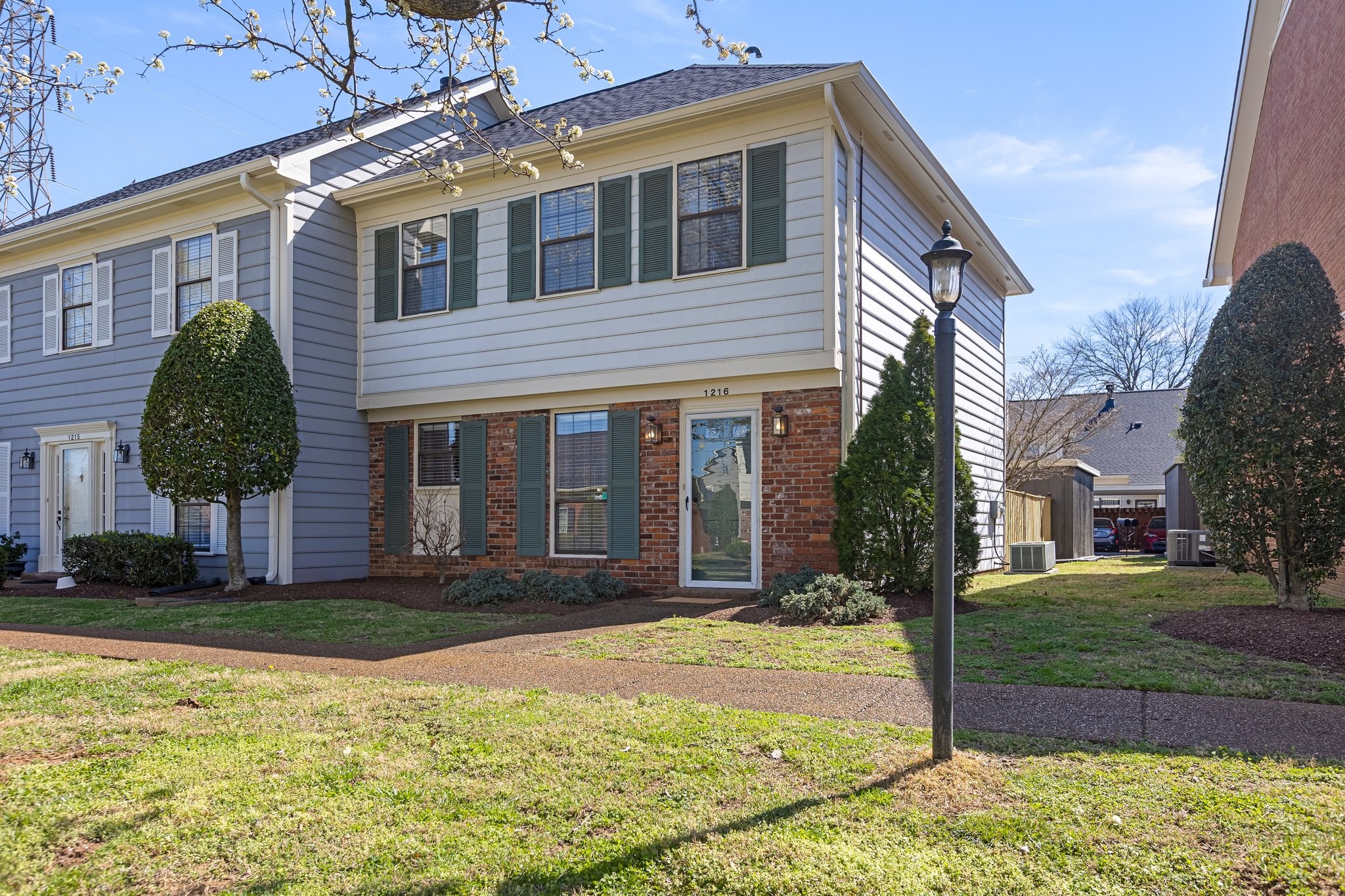 1216 General George Patton Road Nashville, TN 37221 - Photo 3 of 32 a view of a house with a yard and plants