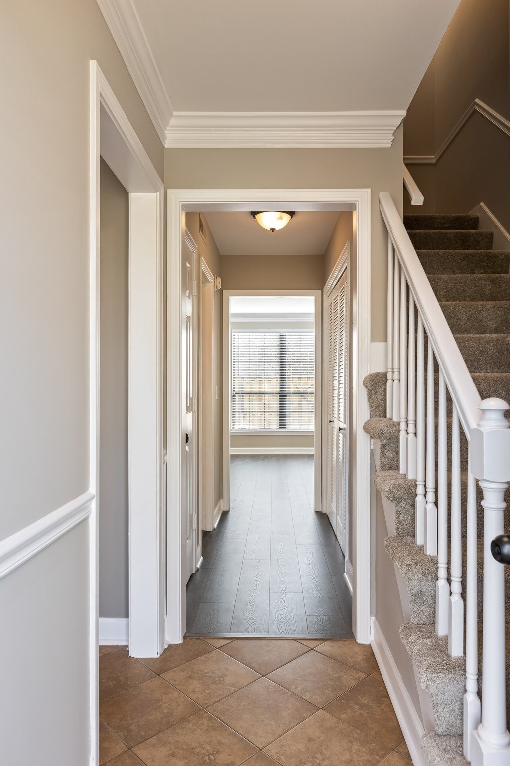 1216 General George Patton Road Nashville, TN 37221 - Photo 5 of 32 a view of a hallway with wooden floor and staircase