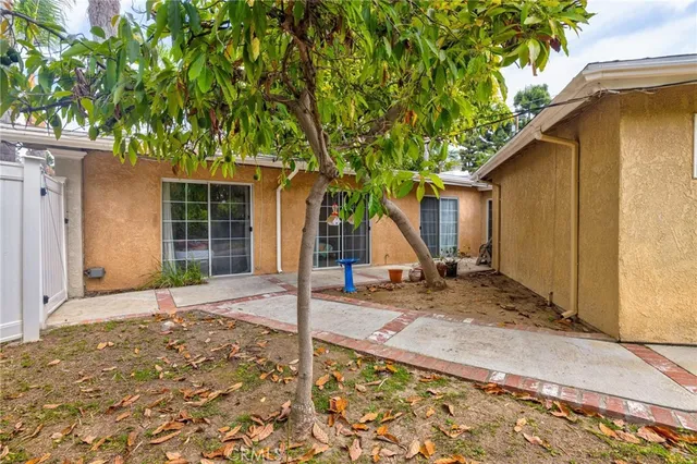 a backyard of a house with seating space