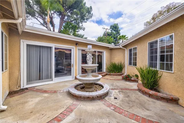 a view of a porch with furniture