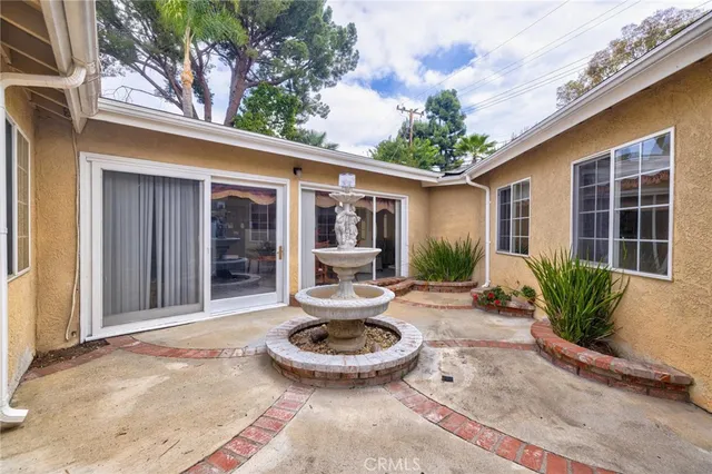 a view of a porch with furniture