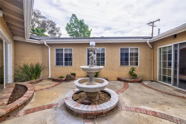 a view of a backyard with a garden
