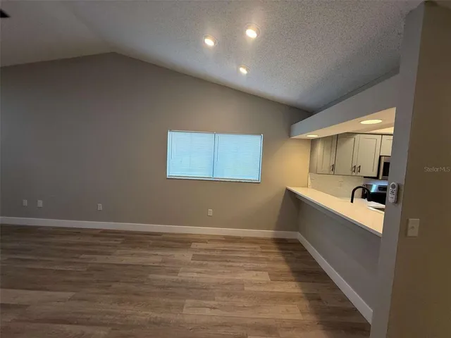 a bathroom with a sink and a large mirror