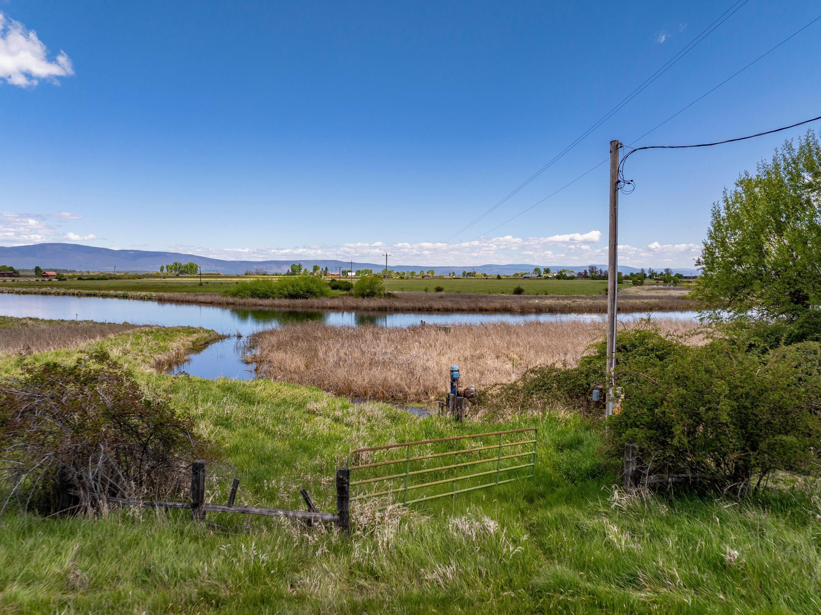 0 Spring Creek Road Fall River Mills, CA 96028 - Photo 35 of 60 a view of a lake with a big yard
