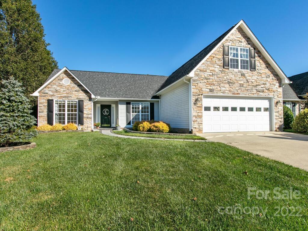 294 Farm Valley Road Fletcher, NC 28732 - Photo 1 of 36 a front view of a house with a yard