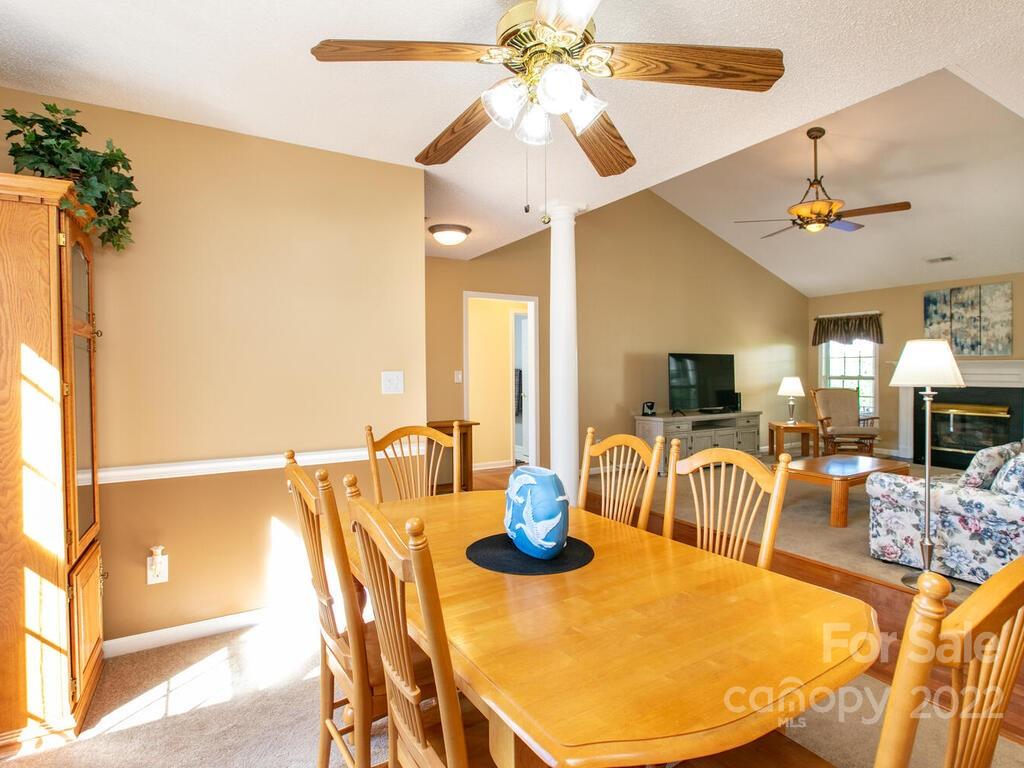 294 Farm Valley Road Fletcher, NC 28732 - Photo 12 of 36 a view of a dining room with furniture and a chandelier