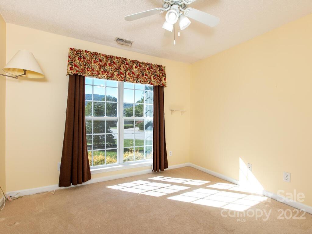 294 Farm Valley Road Fletcher, NC 28732 - Photo 20 of 36 a view of an empty room with a window