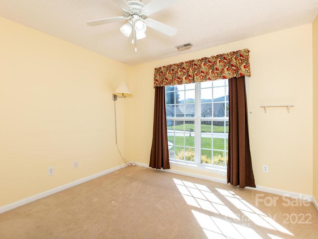294 Farm Valley Road Fletcher, NC 28732 - Photo 21 of 36 a view of an empty room with a window