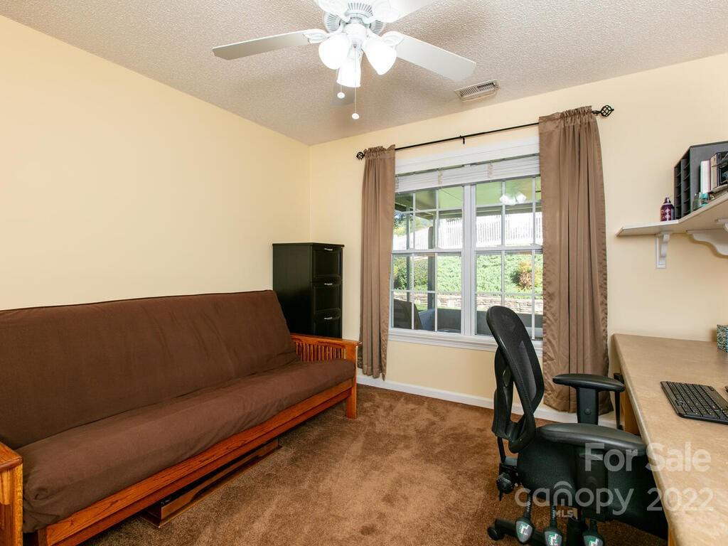 294 Farm Valley Road Fletcher, NC 28732 - Photo 24 of 36 a living room with furniture and a large window