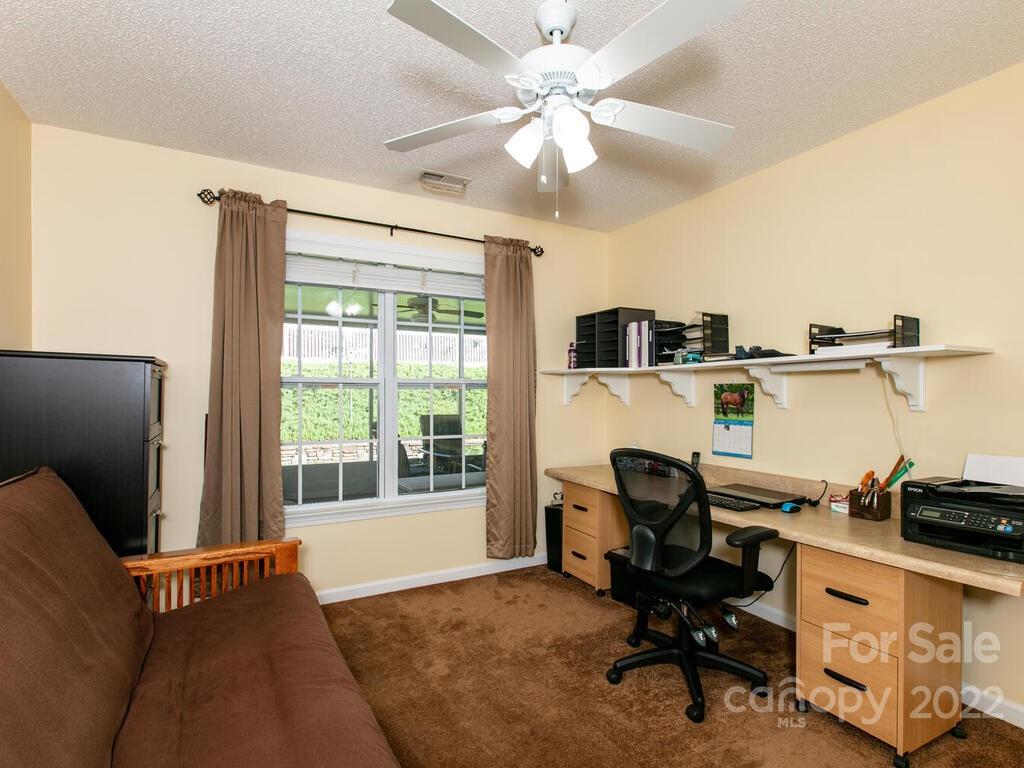 294 Farm Valley Road Fletcher, NC 28732 - Photo 25 of 36 a workspace with furniture and window
