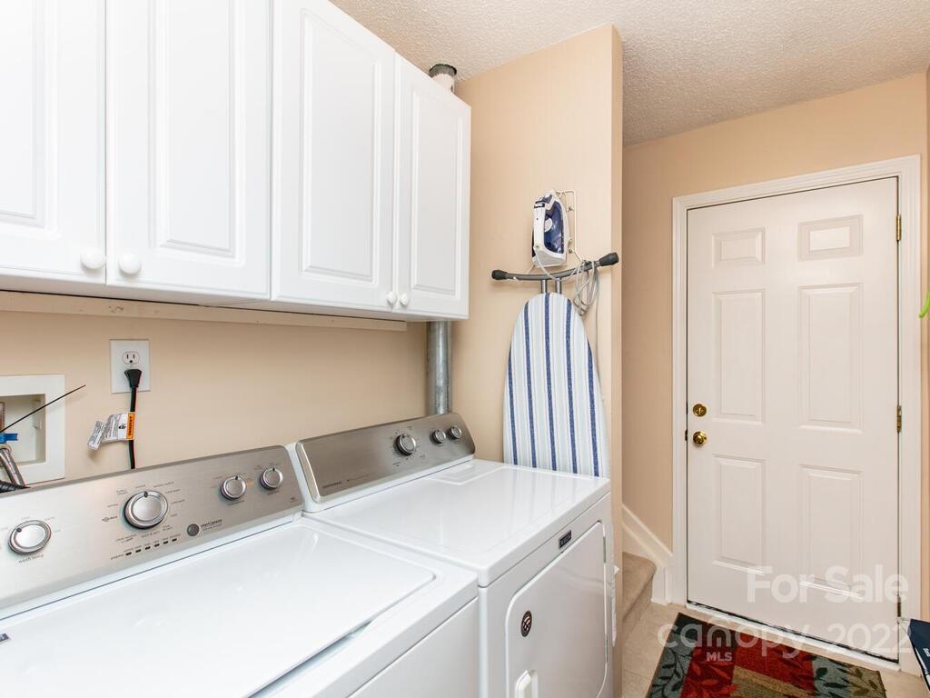 294 Farm Valley Road Fletcher, NC 28732 - Photo 26 of 36 a utility room with dryer and washer